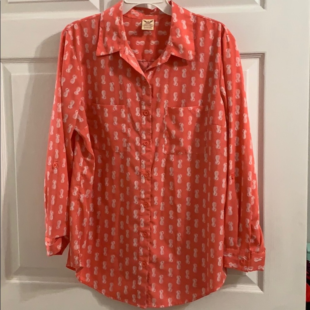 Coral colored, long sleeve button down.